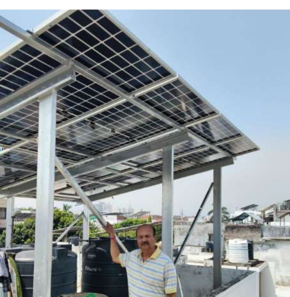 Rooftop solar panel setup installed on a residential building in Gomti Nagar, Lucknow